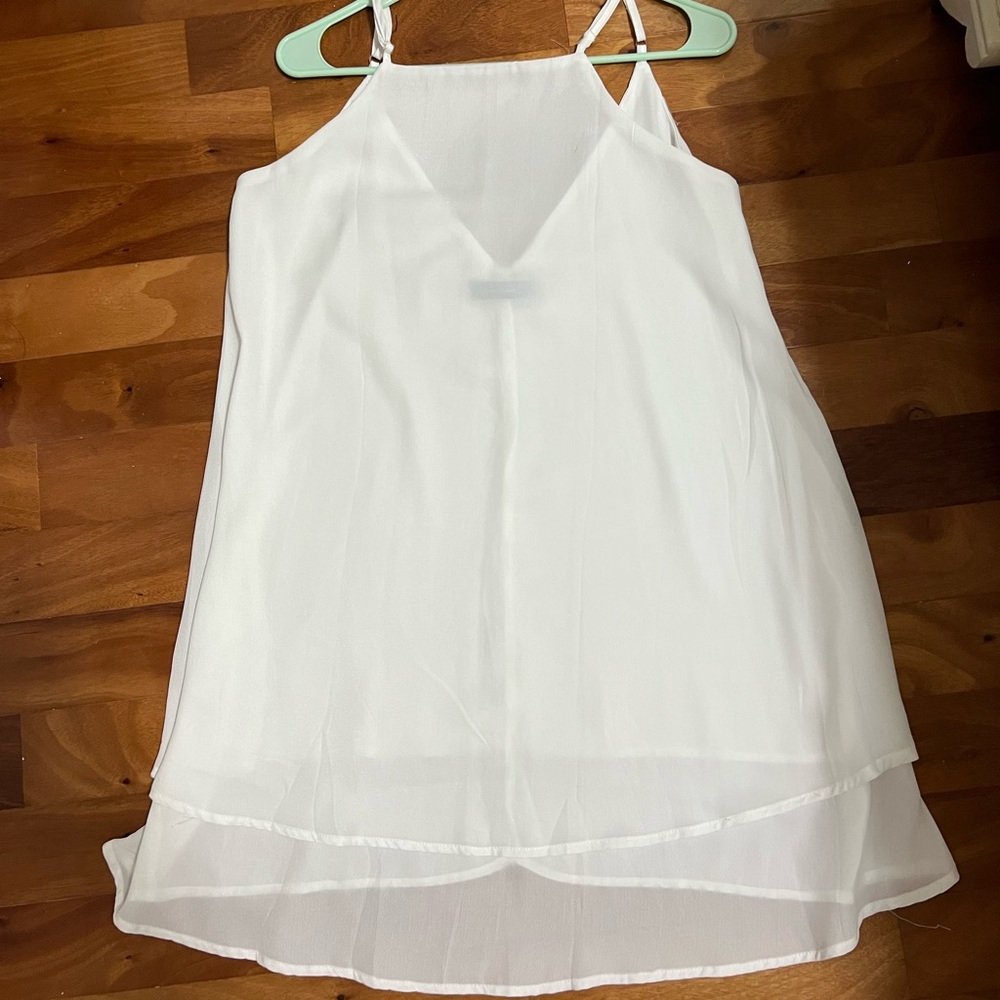 Medium white sleeveless dress